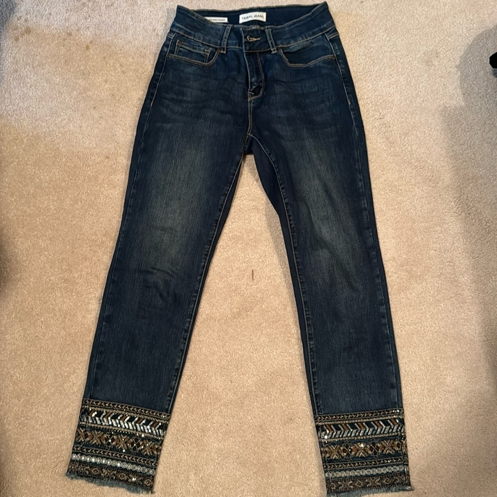 Tribal midrise ankle length jeans. Size 4. Embroidery detail at bottom.
